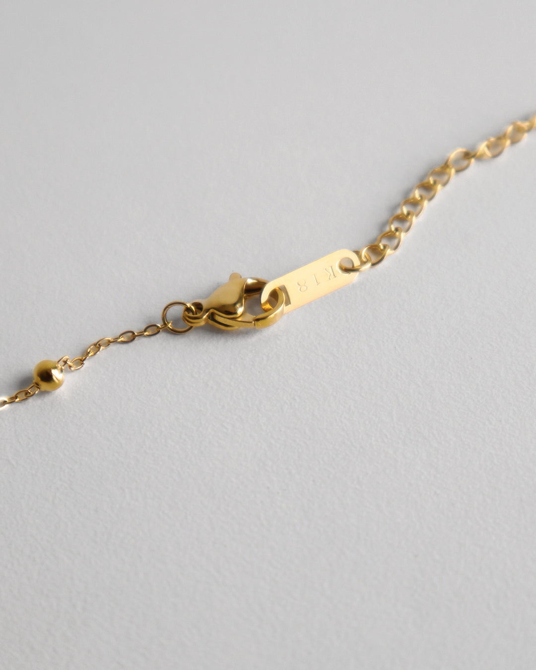X ROSARY NECKLACE GOLD